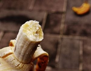 Are bananas good for men, a half-eaten banana