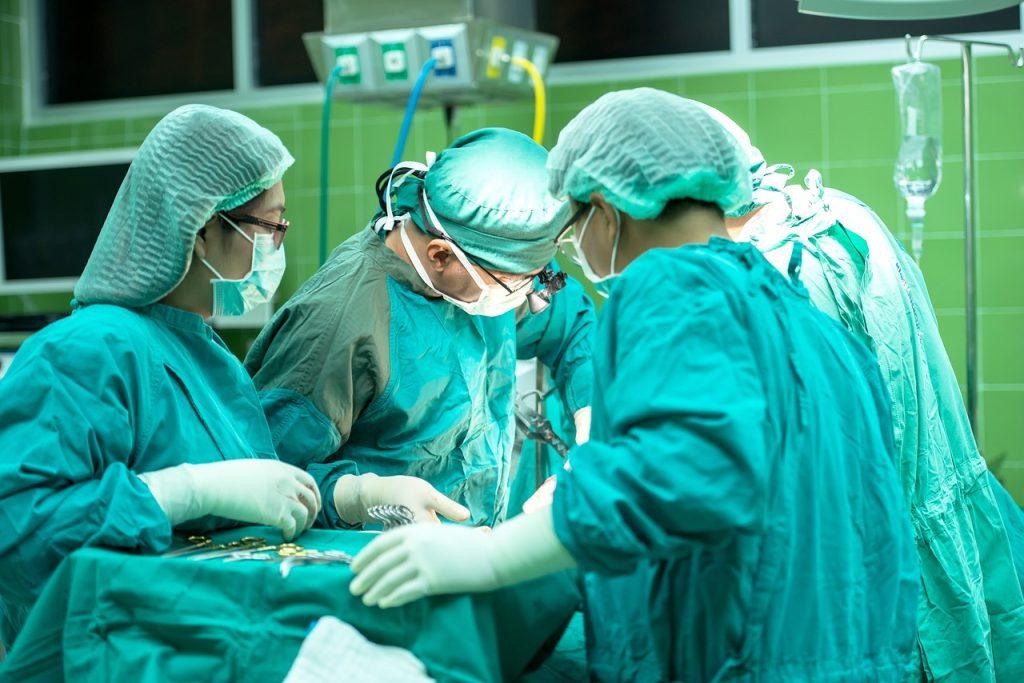 The Link Between Testosterone and Breast Cancer Surgery, a group of doctors performing surgery
