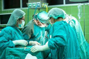 The Link Between Testosterone and Breast Cancer Surgery, a group of doctors performing surgery